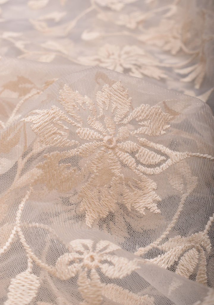 Ivory Floral Embroidery Design with Stone work on Net Saree and Scallop Border