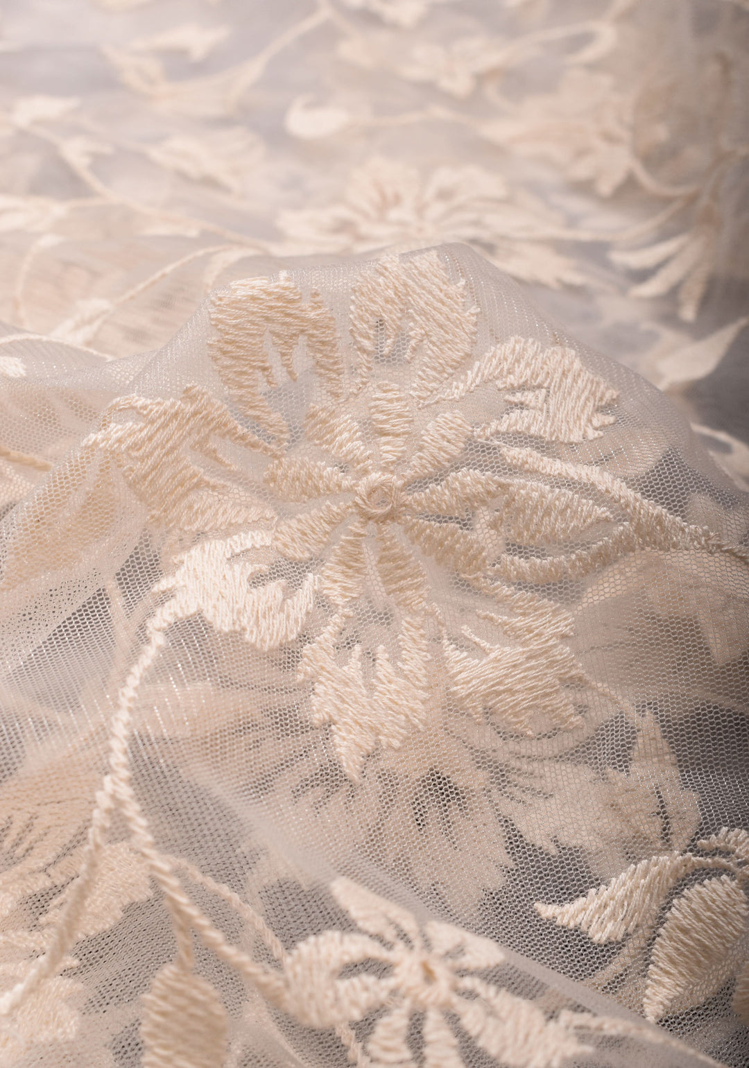 Ivory Floral Embroidery Design with Stone work on Net Saree and Scallop Border