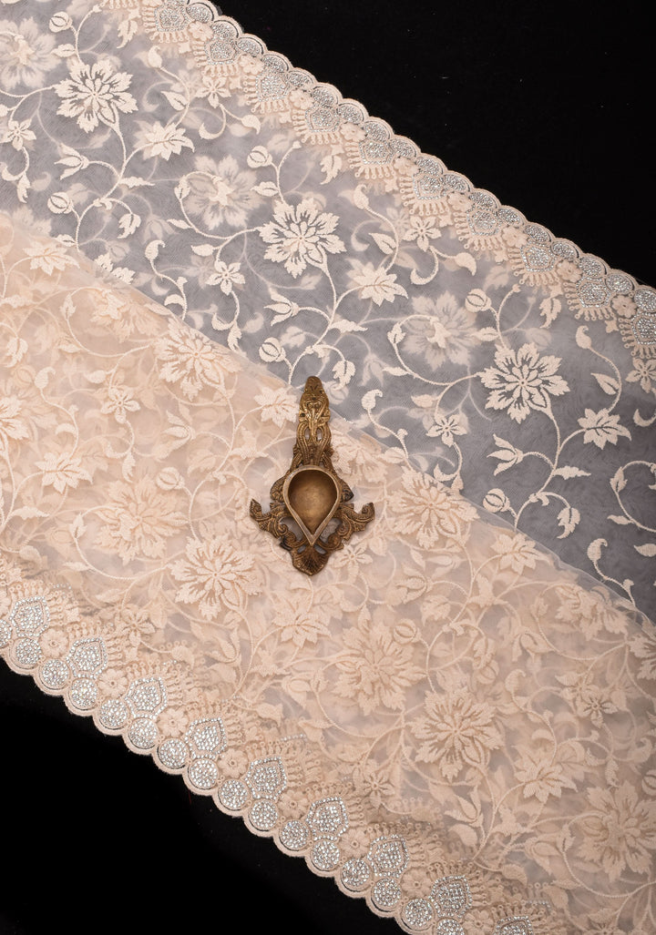 Ivory Floral Embroidery Design with Stone work on Net Saree and Scallop Border