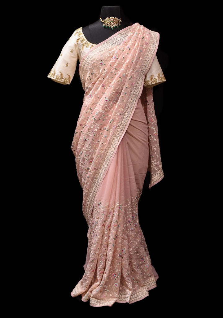 Georgette Saree with Floral Embroidery in Dusty Peach with Dainty Stones Embellishments | SHOBITAM