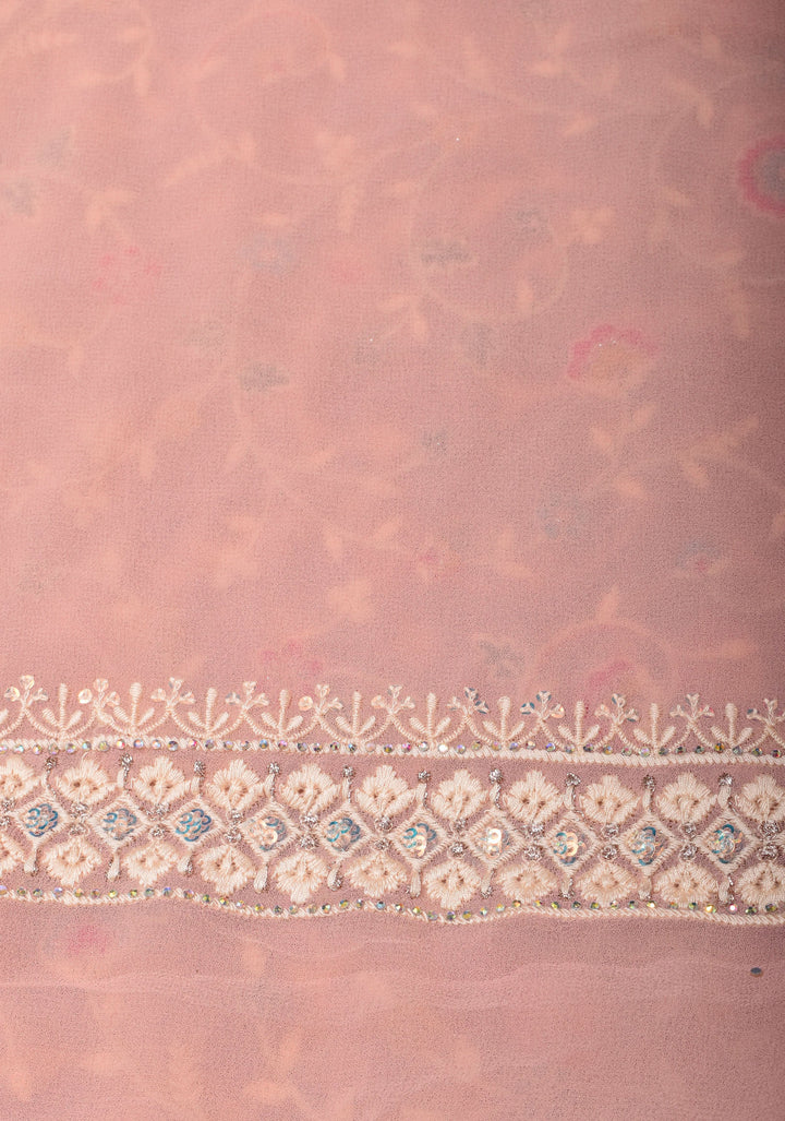 Georgette Saree with Floral Embroidery in Dusty Peach with Dainty Stones Embellishments | SHOBITAM