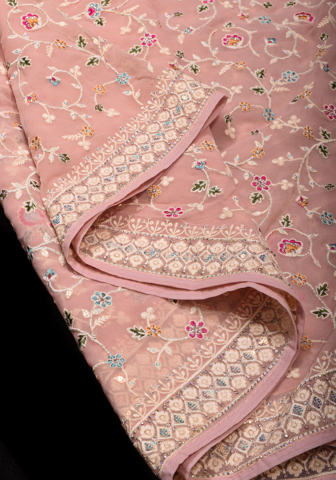 Georgette Saree with Floral Embroidery in Dusty Peach with Dainty Stones Embellishments | SHOBITAM