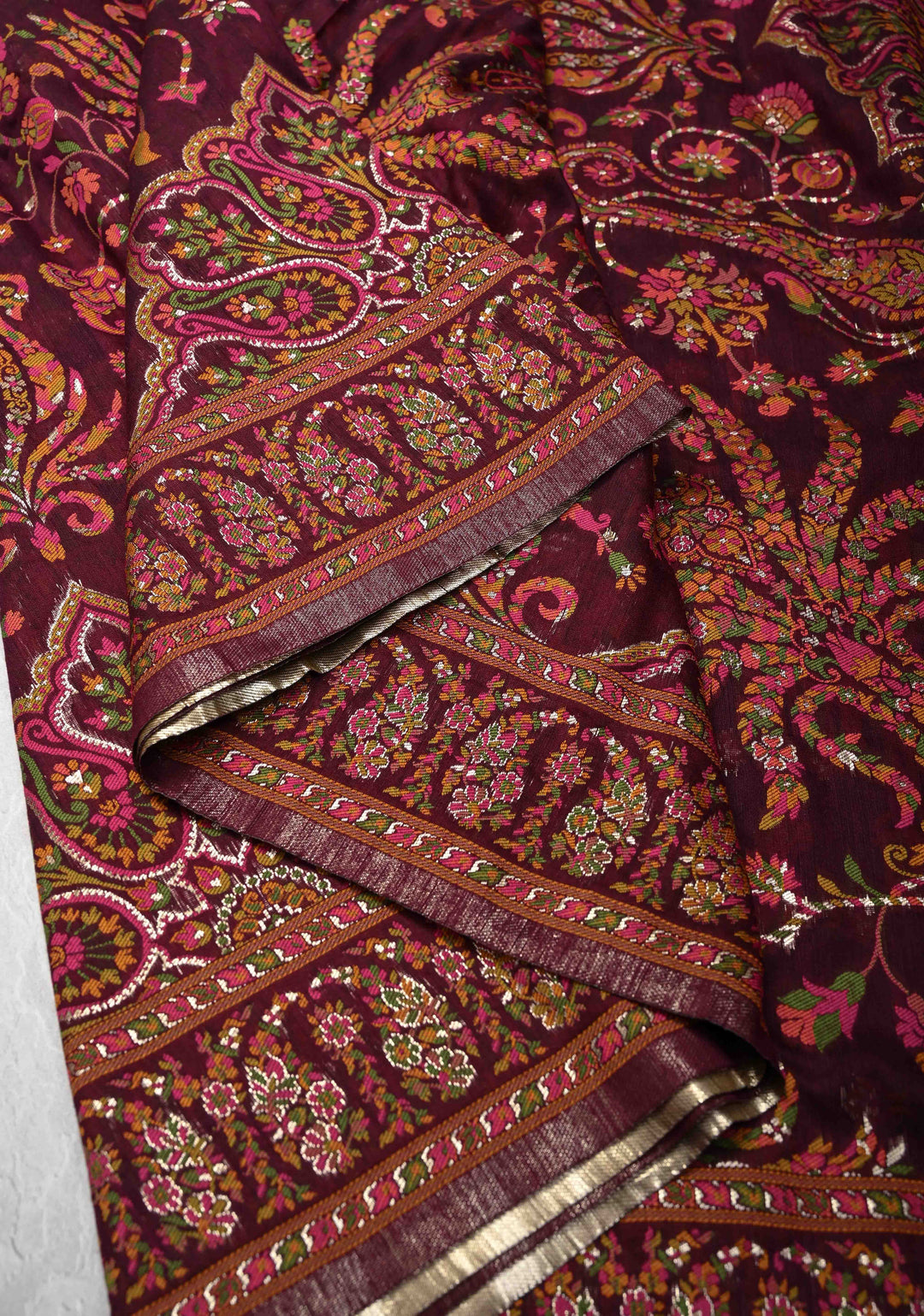 Kani Design with Floral Jaal in Dark Plum Rayon Saree.