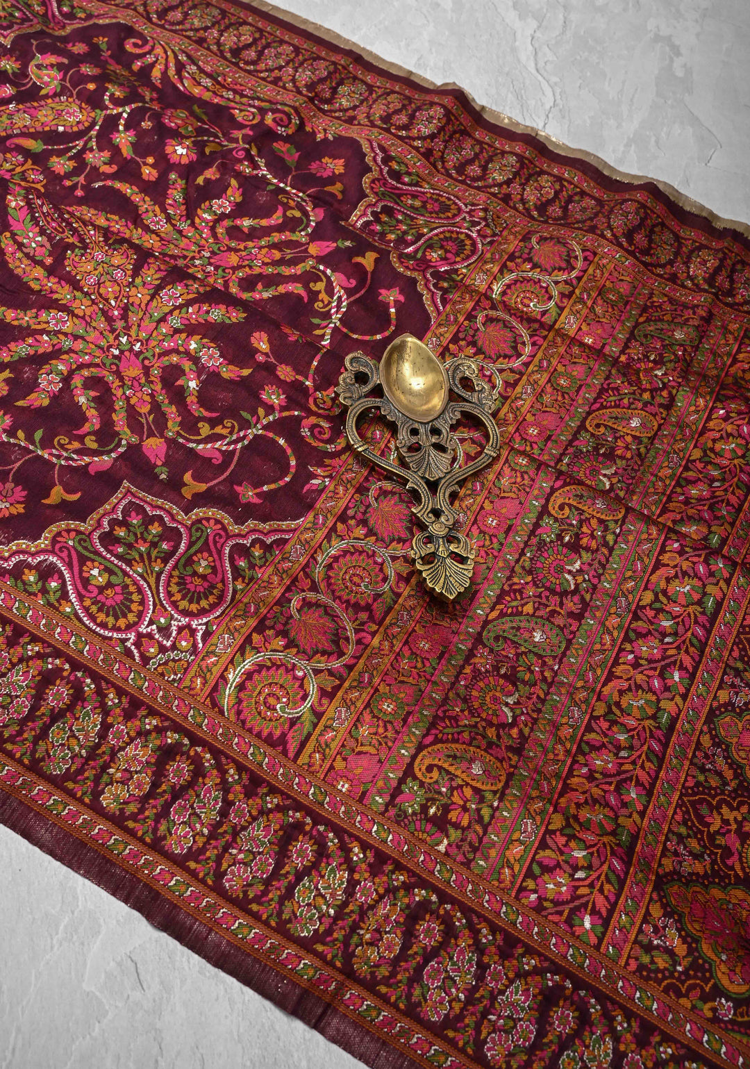 Kani Design with Floral Jaal in Dark Plum Rayon Saree.