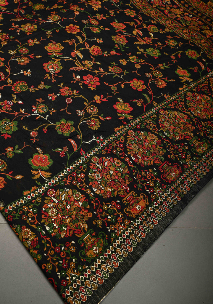 Black Rayon Saree adorned with a Traditional Kani Floral Jaal Pattern. | SHOBITAM