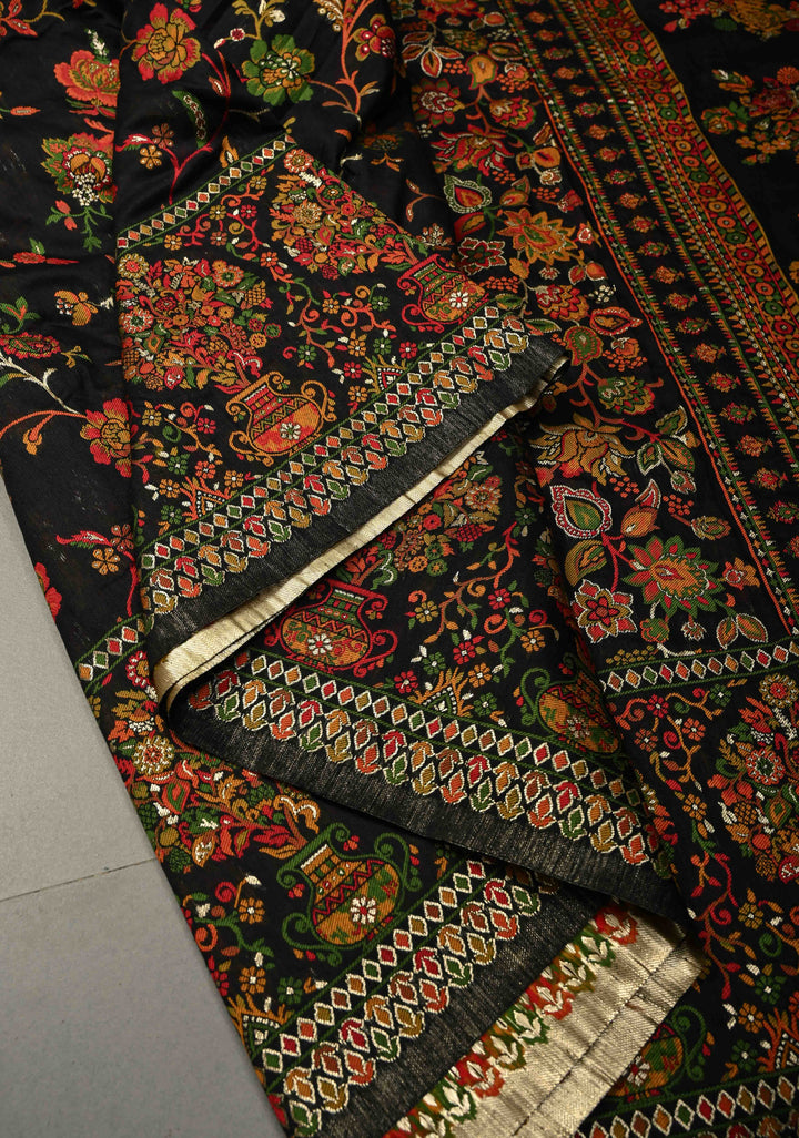 Black Rayon Saree adorned with a Traditional Kani Floral Jaal Pattern. | SHOBITAM