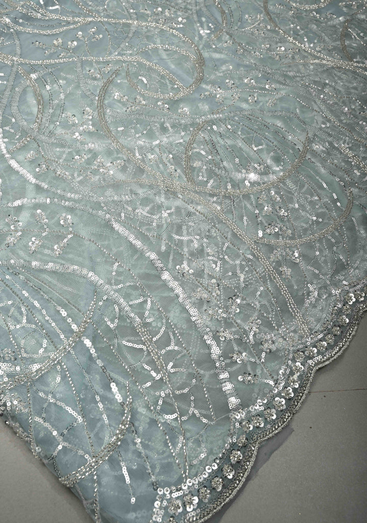 Powder Blue Swirling Design Sequins, Cutdana on Net Saree with Scallop Border | SHOBITAM