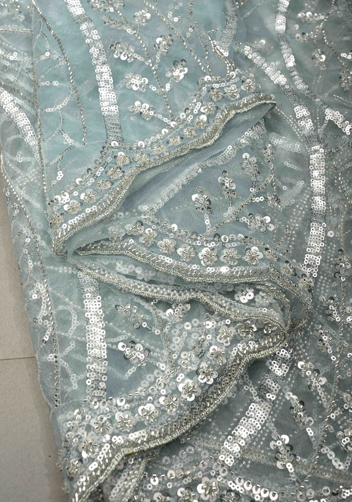 Powder Blue Swirling Design Sequins, Cutdana on Net Saree with Scallop Border | SHOBITAM
