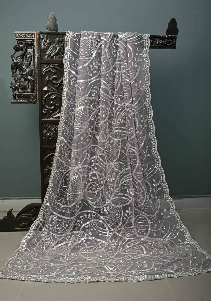 Mauve Swirling Design Sequins, Cutdana on Net Saree with Scallop Border | SHOBITAM