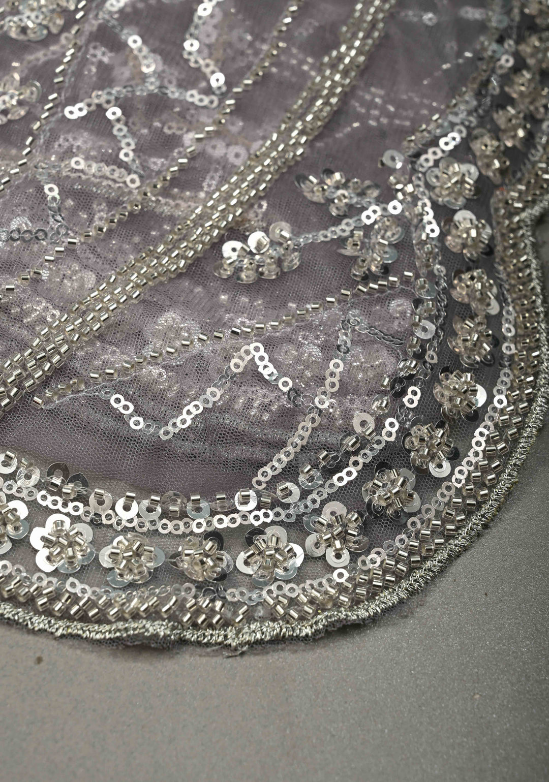 Mauve Swirling Design Sequins, Cutdana on Net Saree with Scallop Border | SHOBITAM