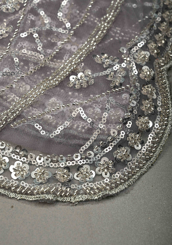 Mauve Swirling Design Sequins, Cutdana on Net Saree with Scallop Border | SHOBITAM