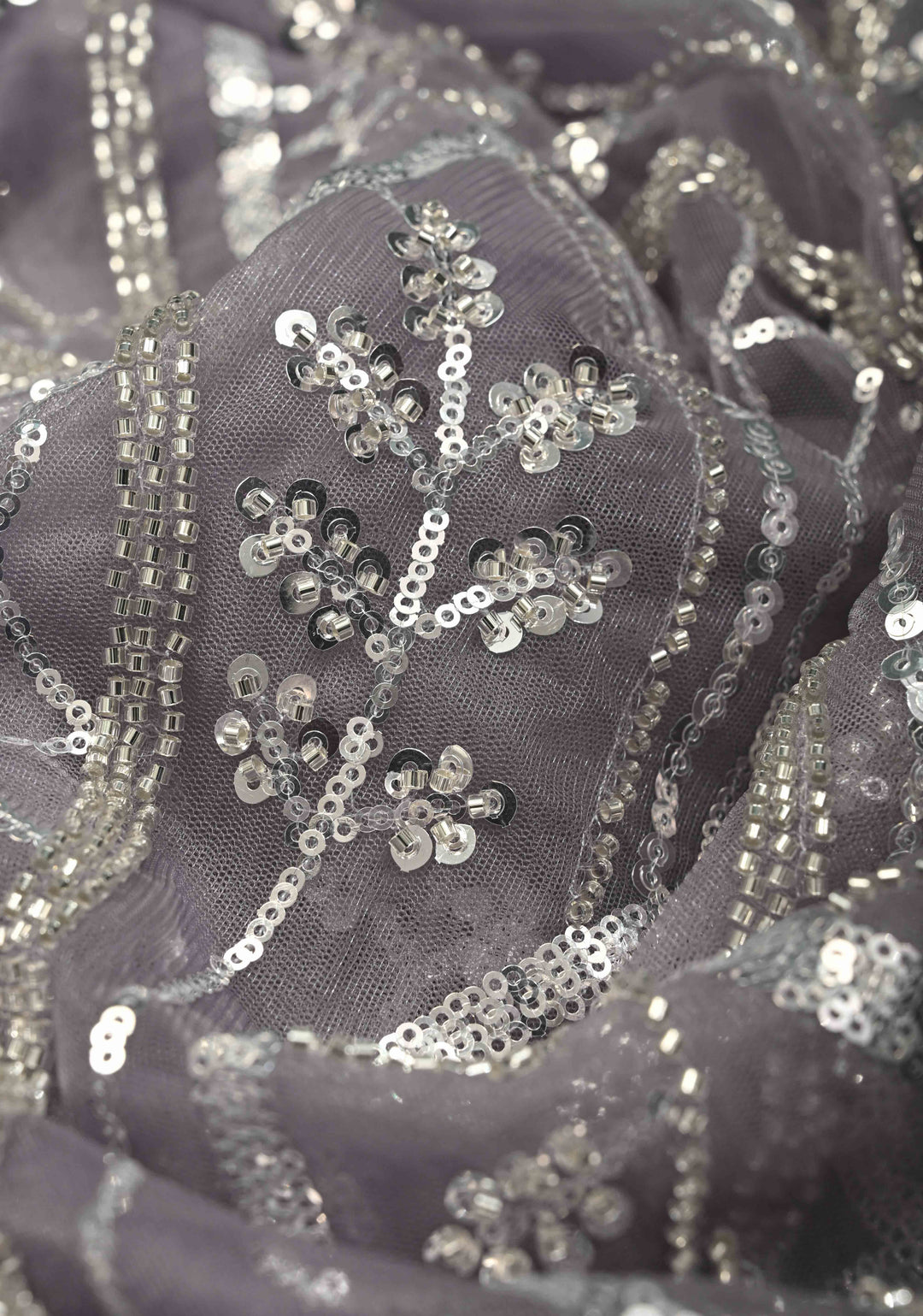 Mauve Swirling Design Sequins, Cutdana on Net Saree with Scallop Border | SHOBITAM
