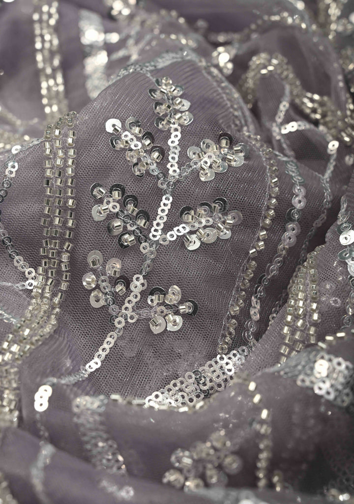 Mauve Swirling Design Sequins, Cutdana on Net Saree with Scallop Border | SHOBITAM