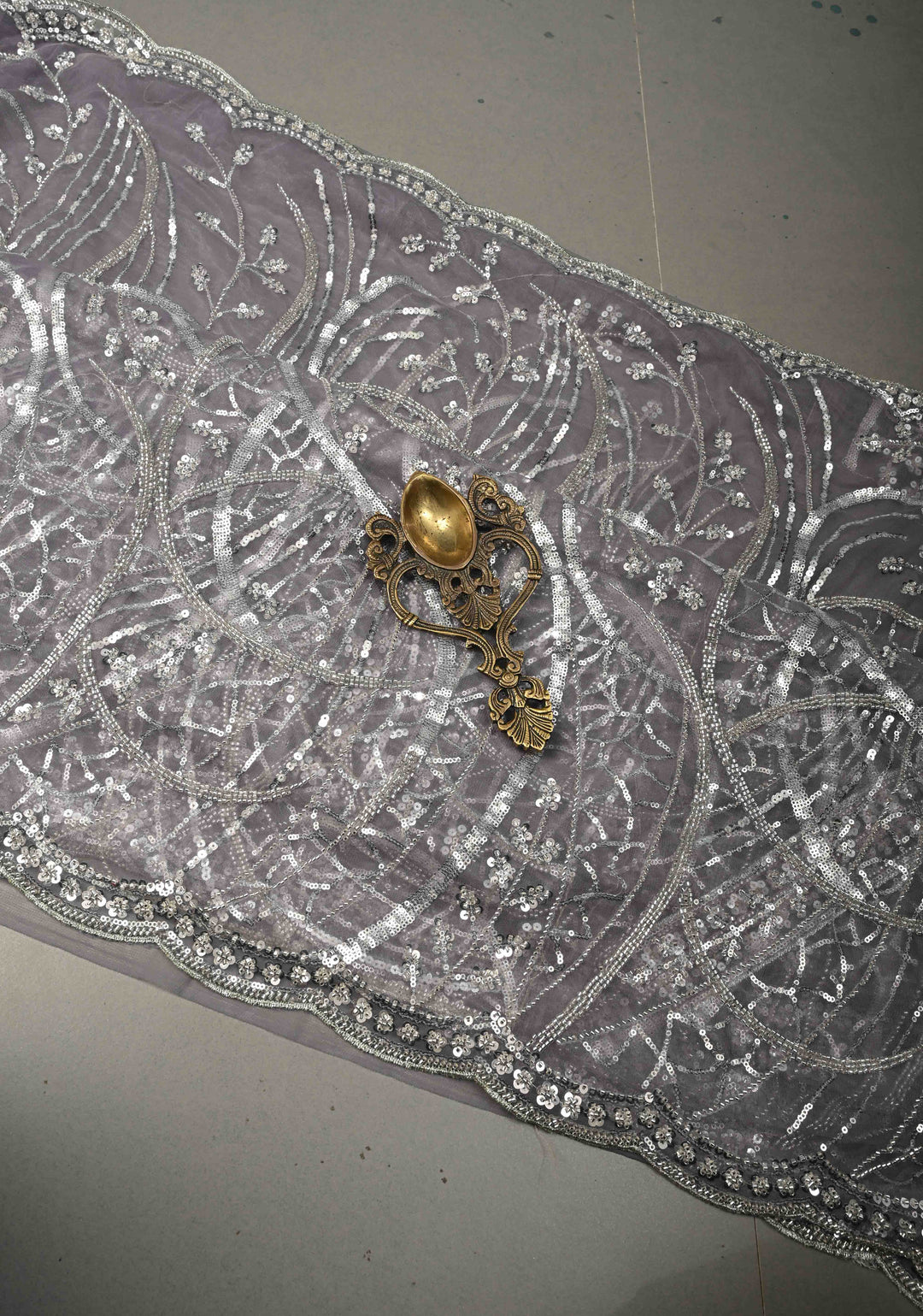 Mauve Swirling Design Sequins, Cutdana on Net Saree with Scallop Border | SHOBITAM