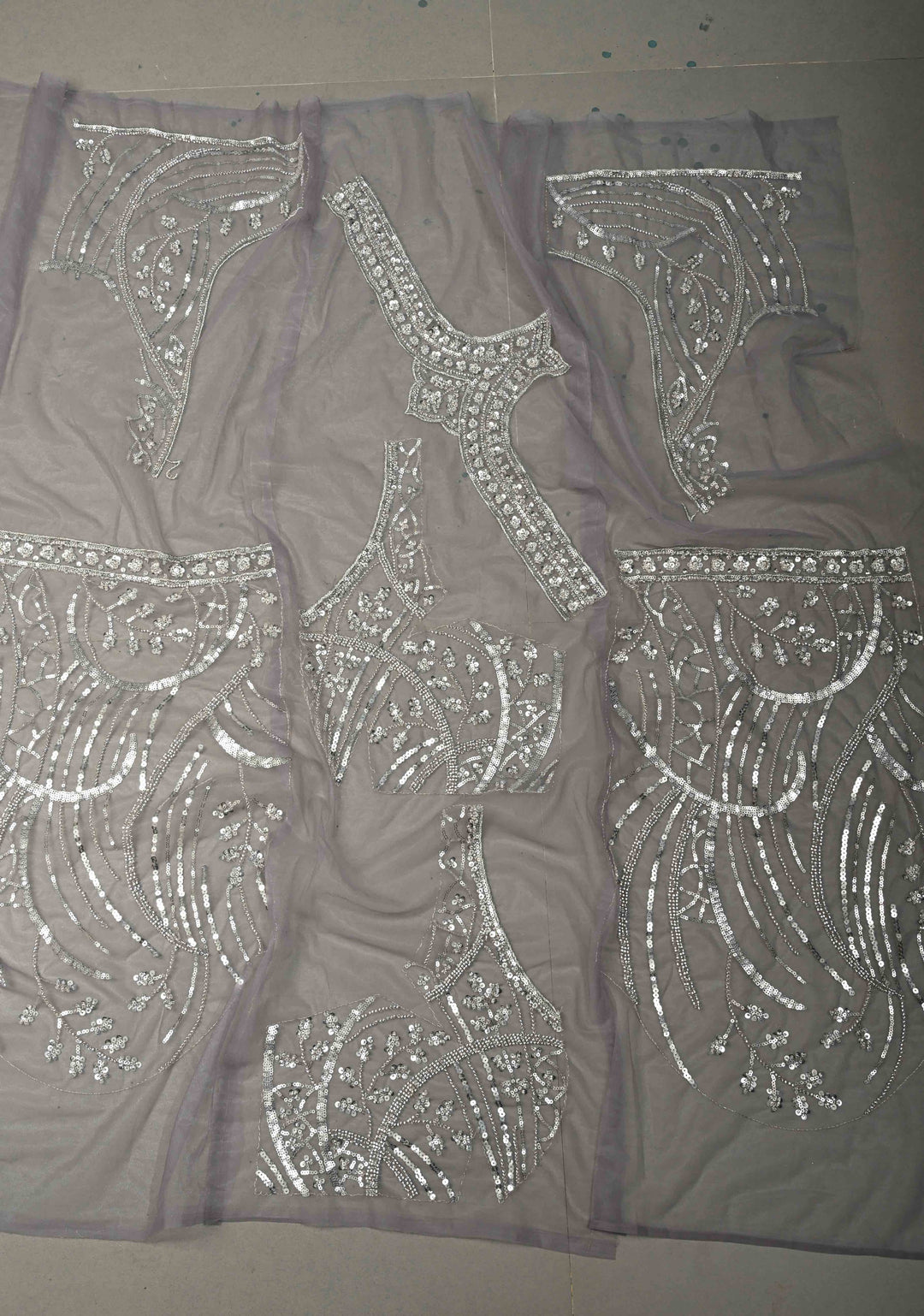 Mauve Swirling Design Sequins, Cutdana on Net Saree with Scallop Border | SHOBITAM