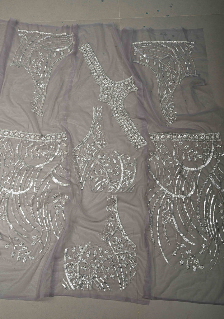 Mauve Swirling Design Sequins, Cutdana on Net Saree with Scallop Border | SHOBITAM