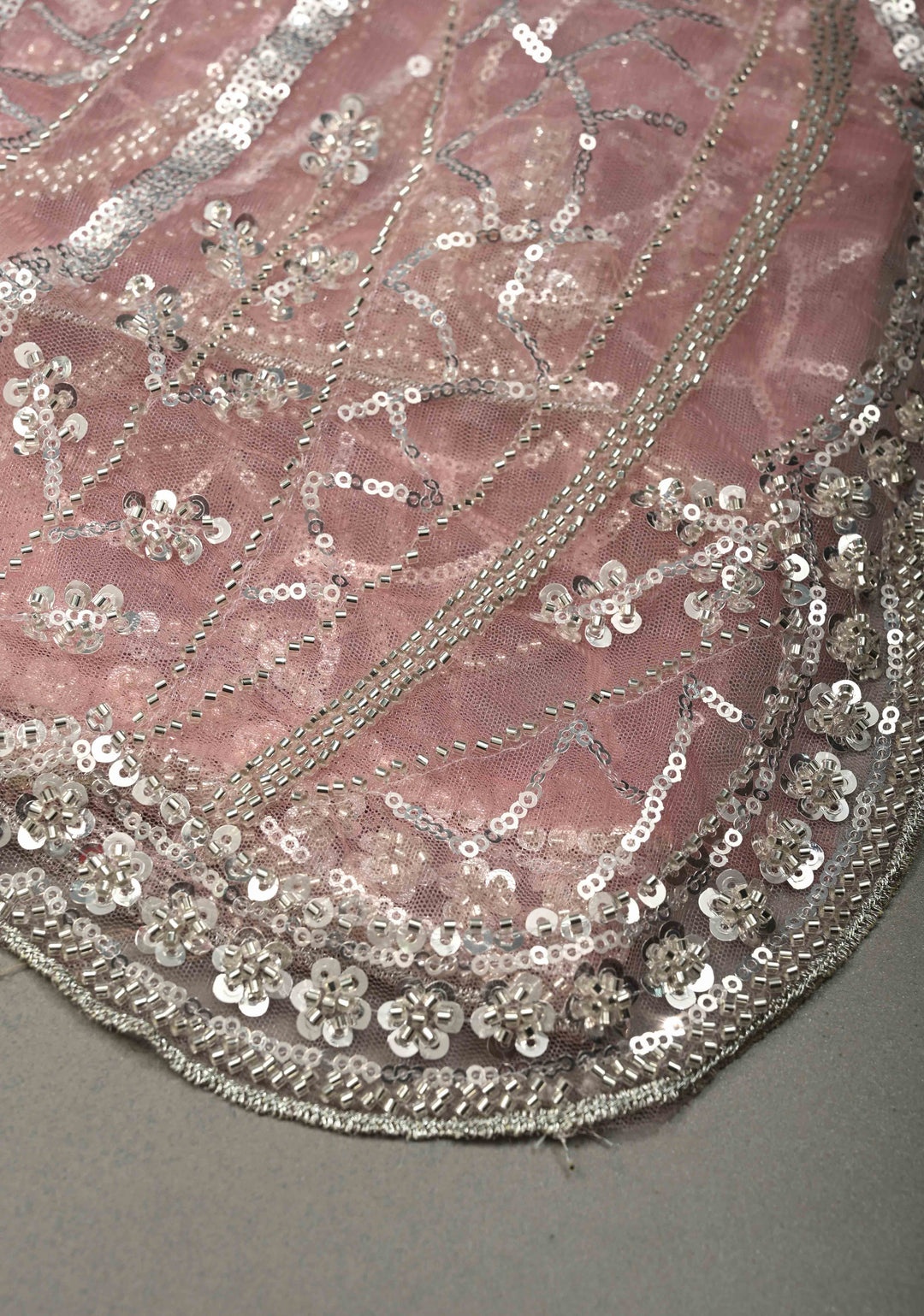 Blush Pink Swirling Design Sequins, Cutdana on Net Saree with Scallop Border | SHOBITAM
