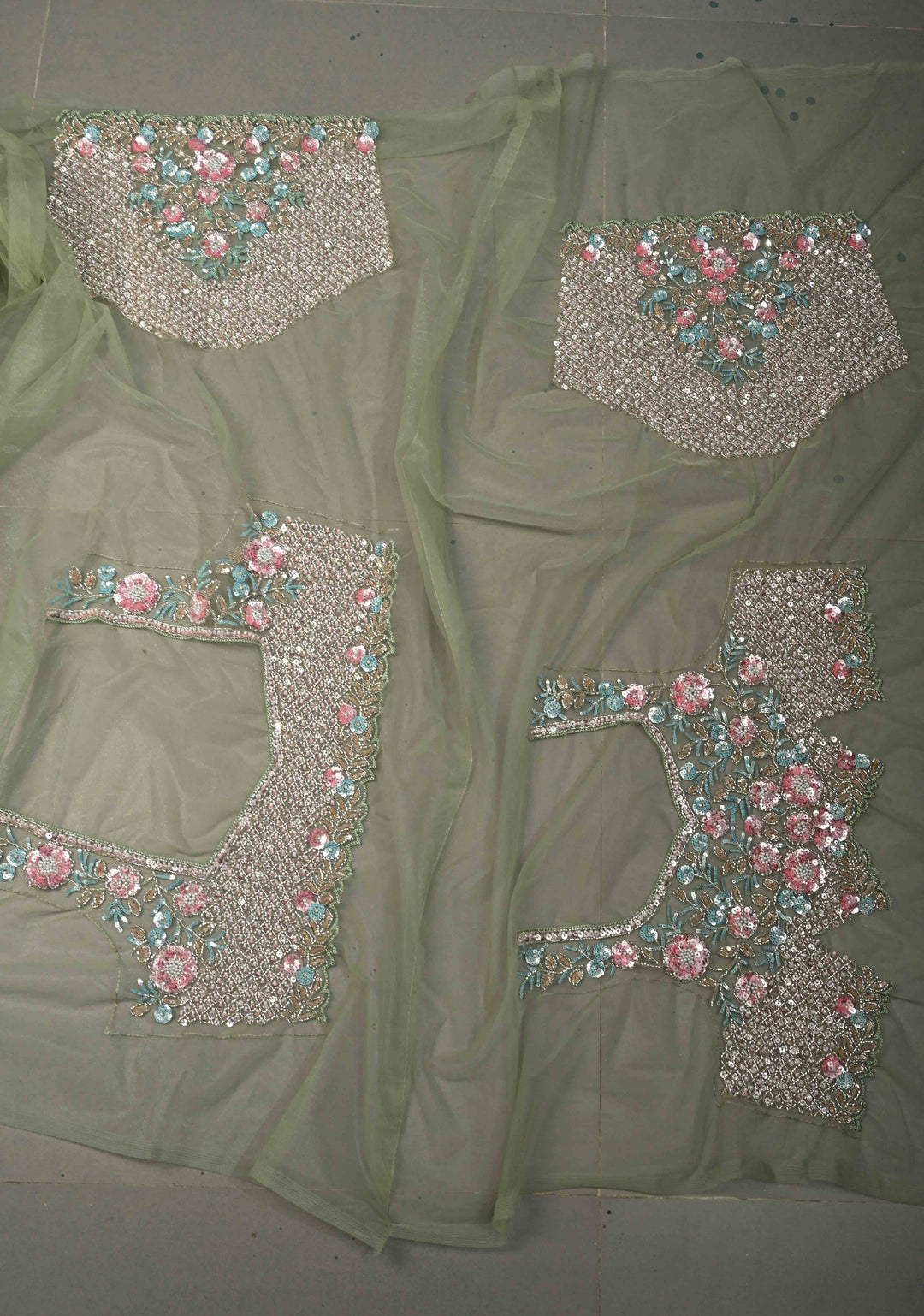 Sage Green Meenakari Cutdana, Sequins and Moti Embellishment on Net Saree with Geometric Design and Stone Work | SHOBITAM