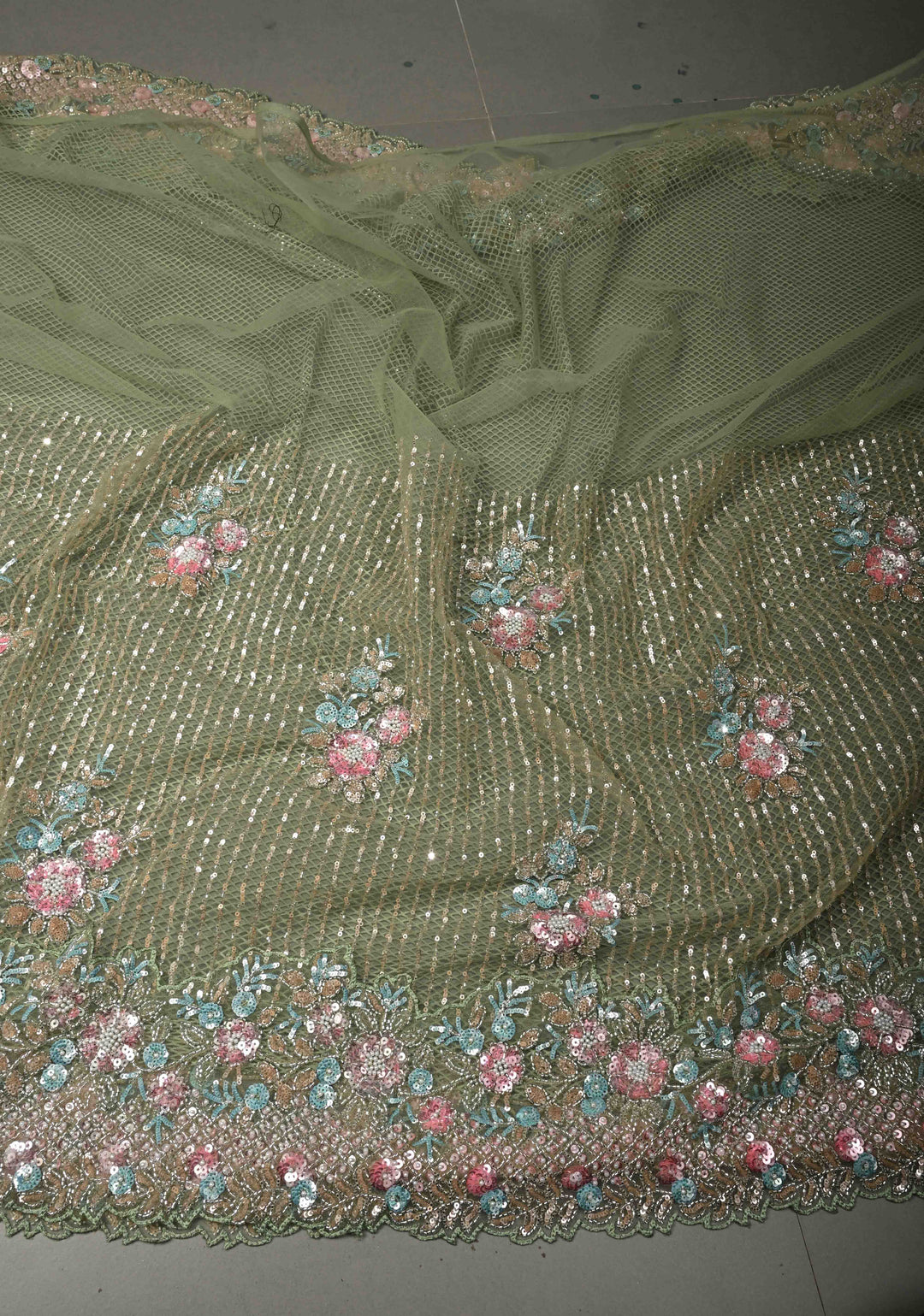 Sage Green Meenakari Cutdana, Sequins and Moti Embellishment on Net Saree with Geometric Design and Stone Work | SHOBITAM