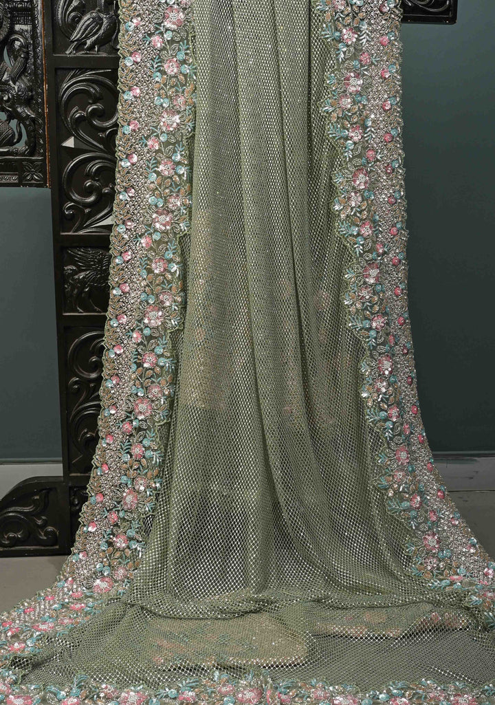 Sage Green Meenakari Cutdana, Sequins and Moti Embellishment on Net Saree with Geometric Design and Stone Work | SHOBITAM
