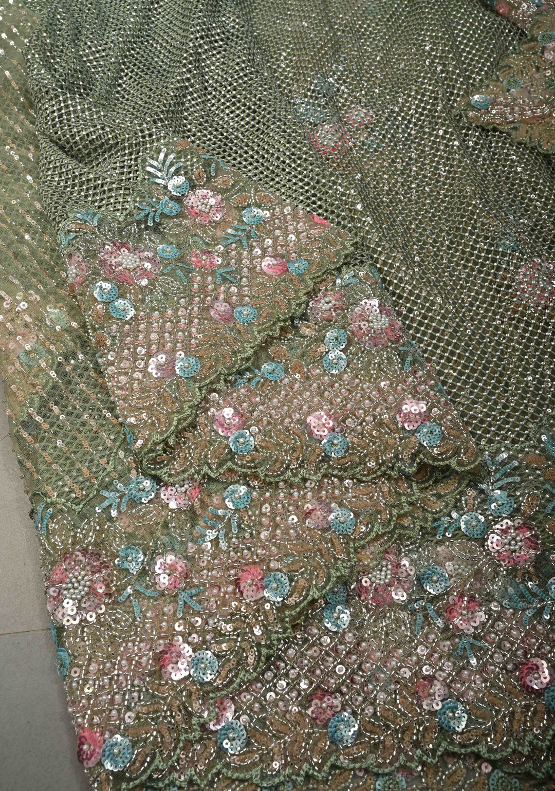 Sage Green Meenakari Cutdana, Sequins and Moti Embellishment on Net Saree with Geometric Design and Stone Work | SHOBITAM