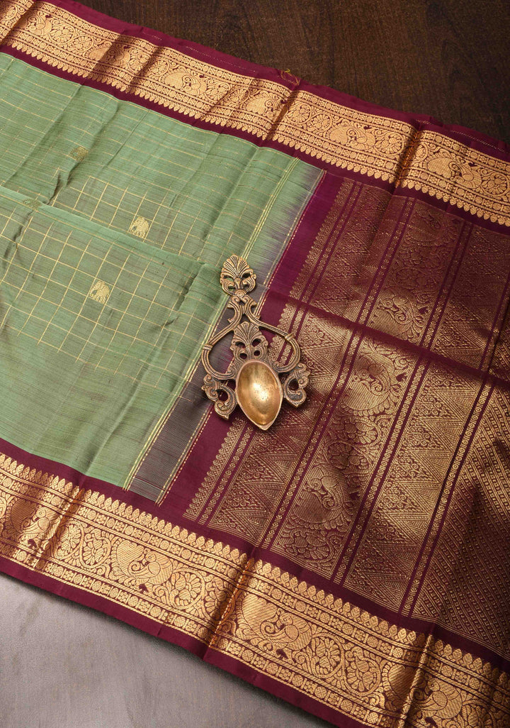 Bottle Green Kanjivaram Silk Saree with Zari Checks, Buttas and Contrast Rettaipet Zari Border | SILK MARK CERTIFIED (Copy)