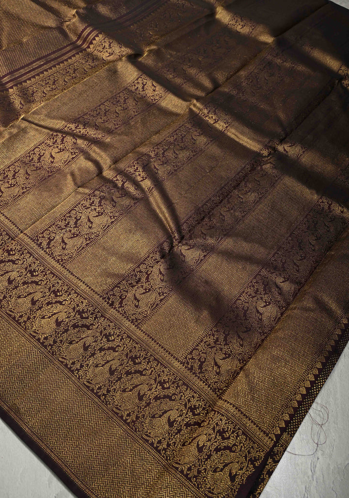 3 Gram Pure Zari Beetlenut Color Pure Kanjivaram Silk Saree with Oxidised Zari Brocade and Peacock Motifs Panel on Zari Border | SILK MARK CERTIFIED