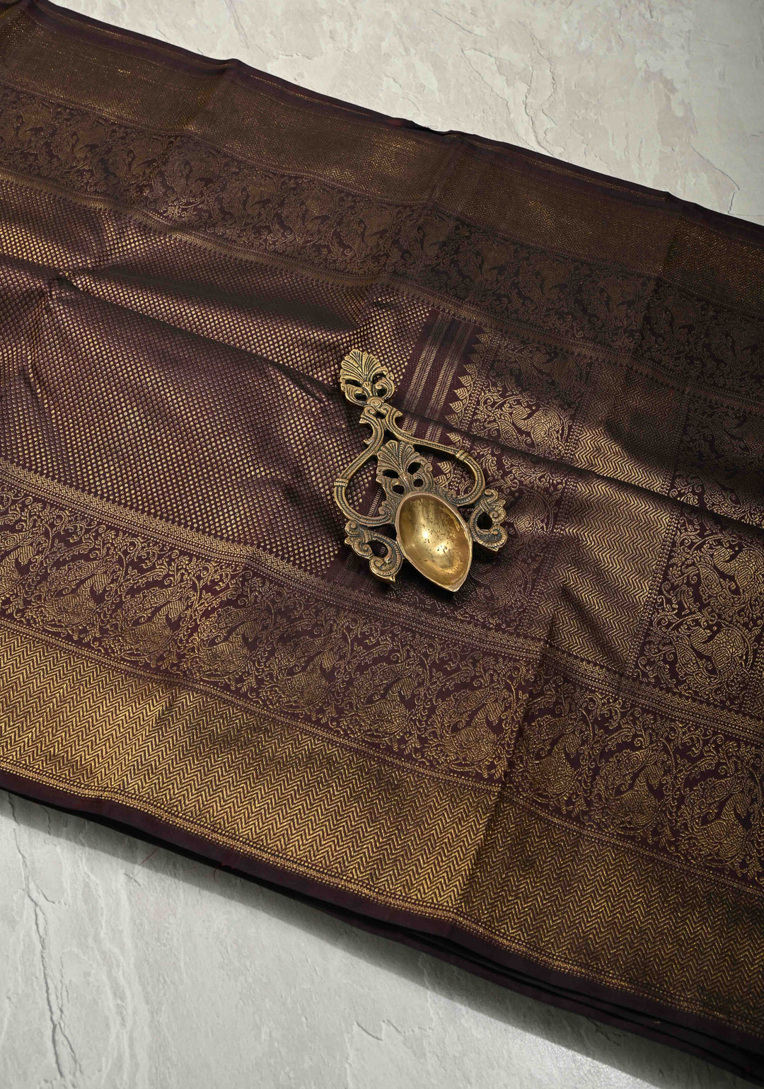 3 Gram Pure Zari Beetlenut Color Pure Kanjivaram Silk Saree with Oxidised Zari Brocade and Peacock Motifs Panel on Zari Border | SILK MARK CERTIFIED