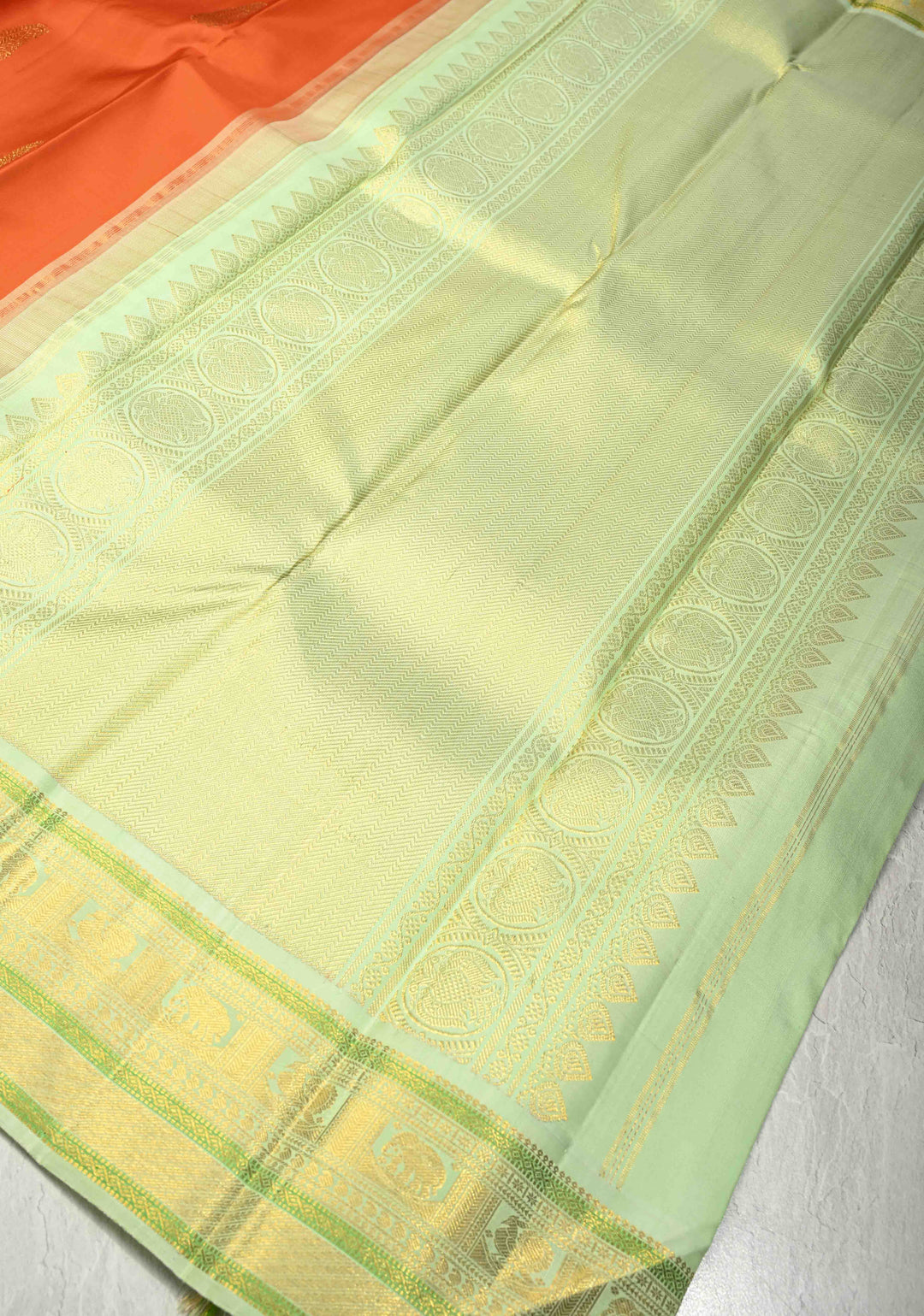 3 Gram Pure Zari Sunset Orange Pure Kanjivaram Silk Saree with Zari Paisley Buttas and Contrast Korvai Zari Border | SILK MARK CERTIFIED