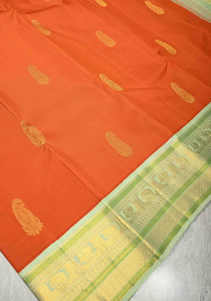 3 Gram Pure Zari Sunset Orange Pure Kanjivaram Silk Saree with Zari Paisley Buttas and Contrast Korvai Zari Border | SILK MARK CERTIFIED