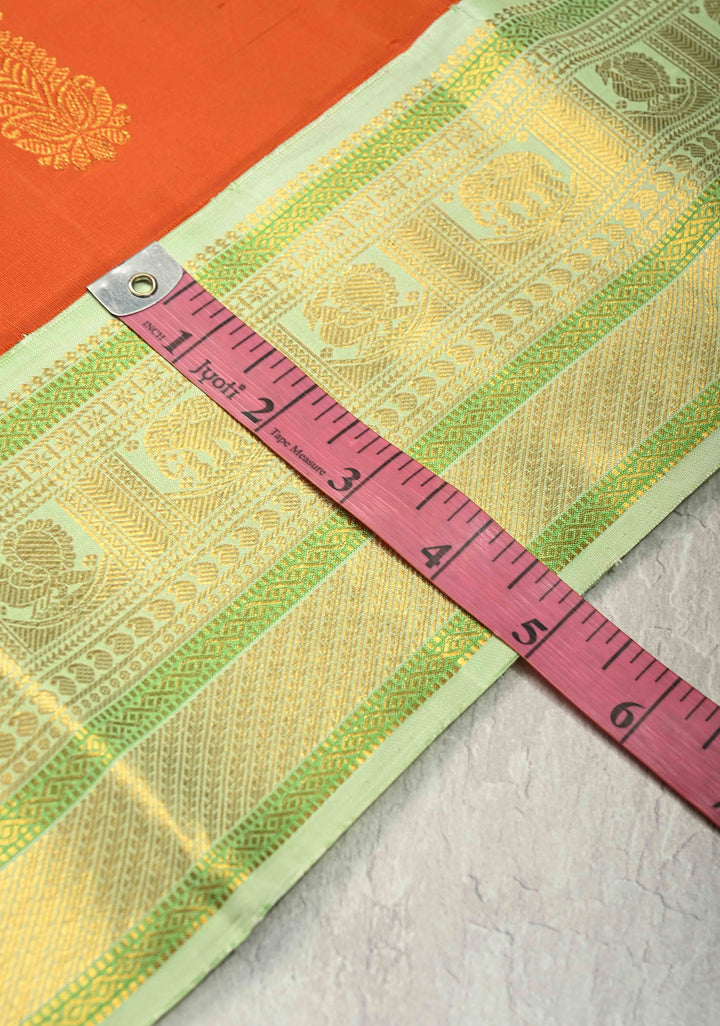 3 Gram Pure Zari Sunset Orange Pure Kanjivaram Silk Saree with Zari Paisley Buttas and Contrast Korvai Zari Border | SILK MARK CERTIFIED