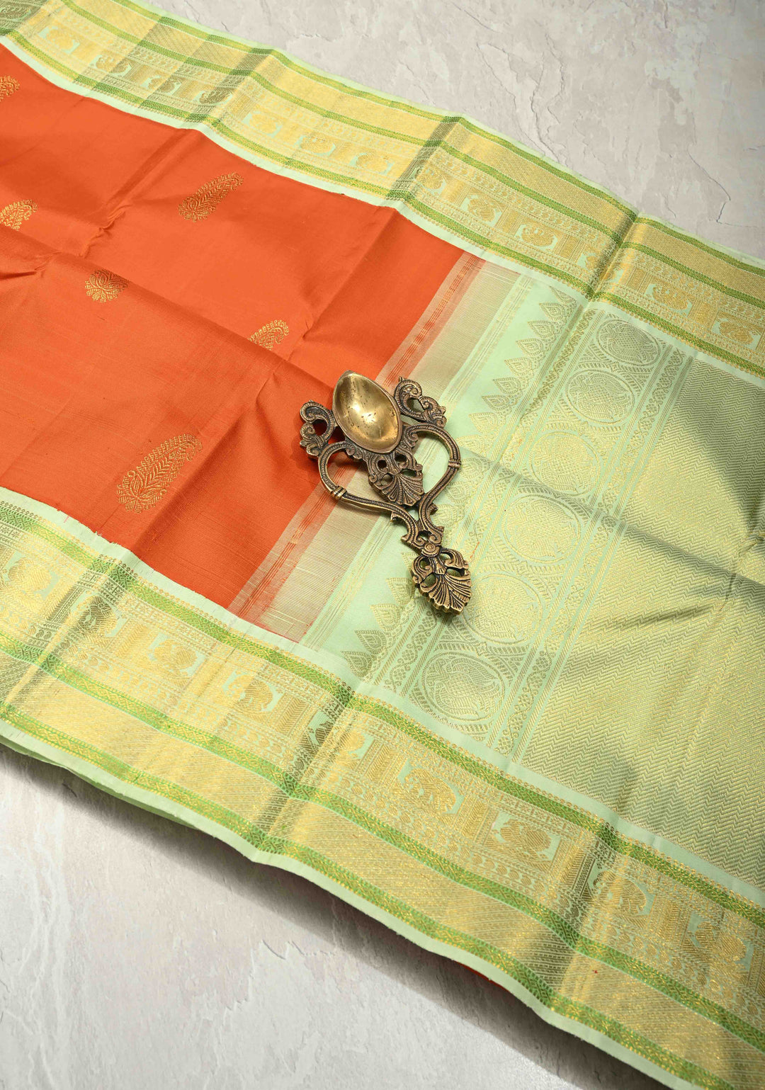 3 Gram Pure Zari Sunset Orange Pure Kanjivaram Silk Saree with Zari Paisley Buttas and Contrast Korvai Zari Border | SILK MARK CERTIFIED