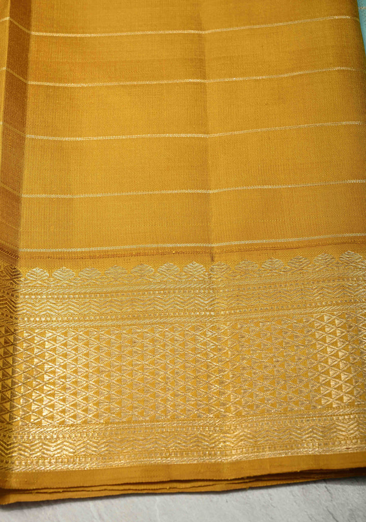 KORVAI Baby Blue Zari Checks on Pure Kanjivaram Silk Saree with Zari Buttas and Mustard Biscuit Muted Zari Border | SILK MARK CERTIFIED