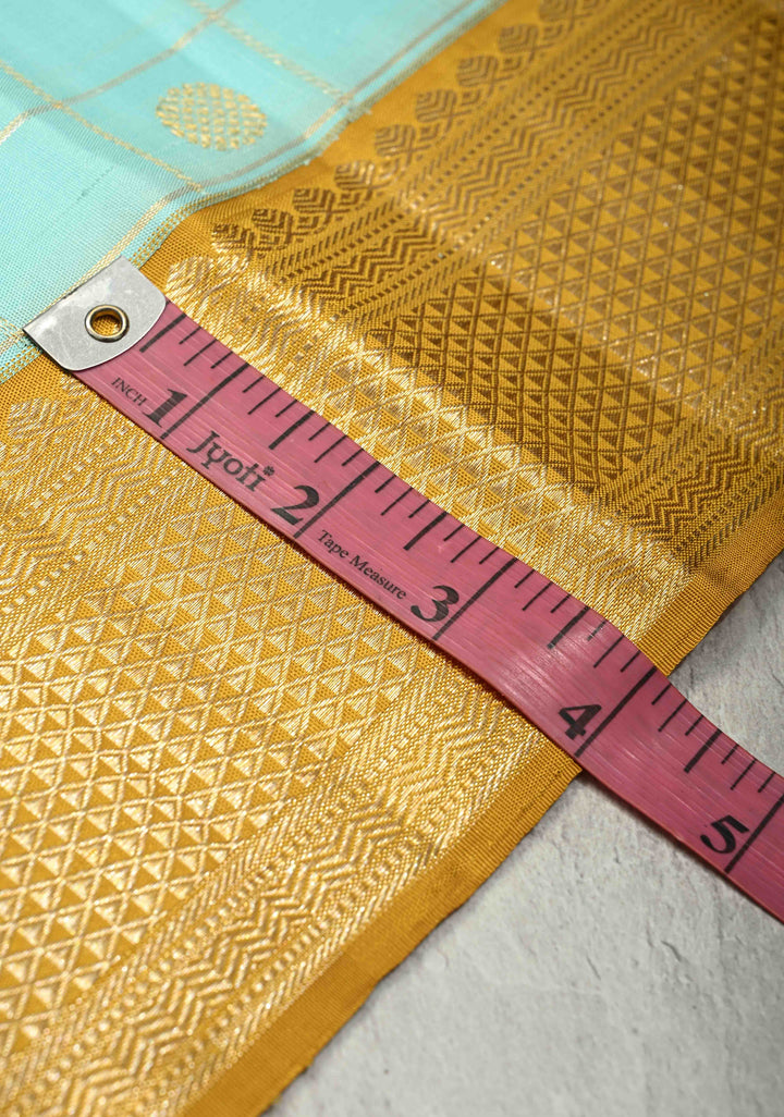 KORVAI Baby Blue Zari Checks on Pure Kanjivaram Silk Saree with Zari Buttas and Mustard Biscuit Muted Zari Border | SILK MARK CERTIFIED