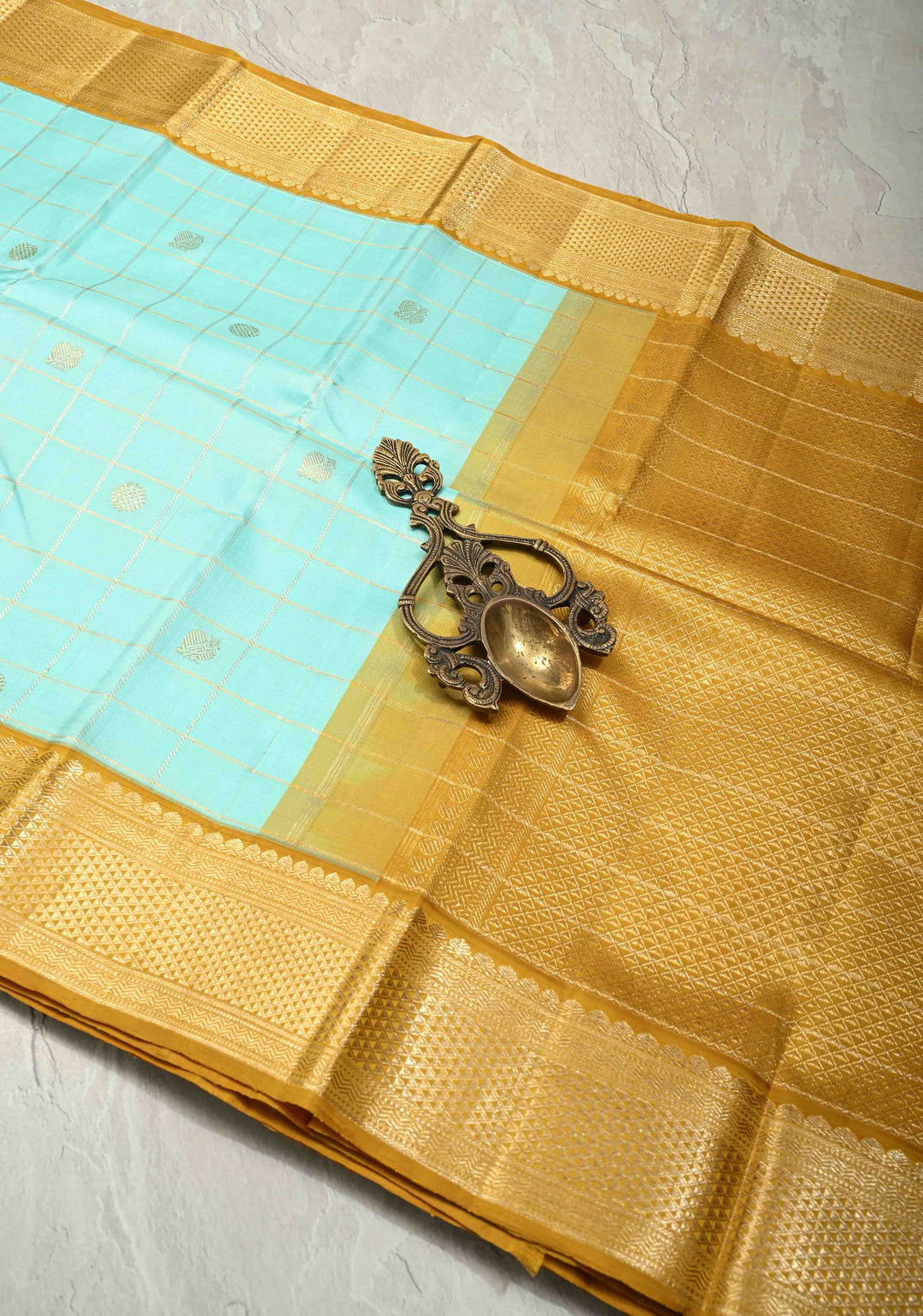 KORVAI Baby Blue Zari Checks on Pure Kanjivaram Silk Saree with Zari Buttas and Mustard Biscuit Muted Zari Border | SILK MARK CERTIFIED
