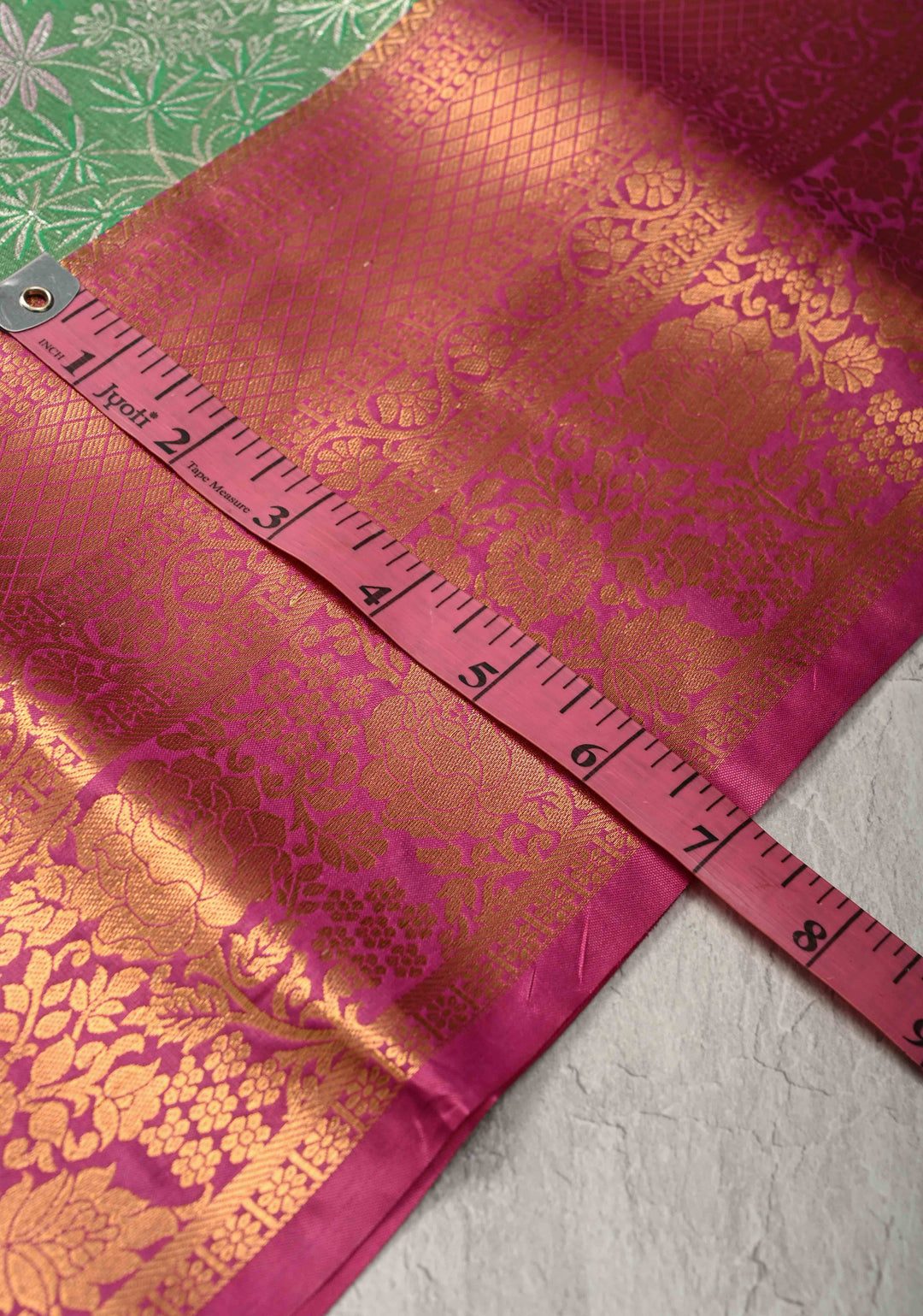 Green Kanjivaram Tissue Semi Silk Saree with Floral Meenakari Brocade Jaal and Contrast Zari Border