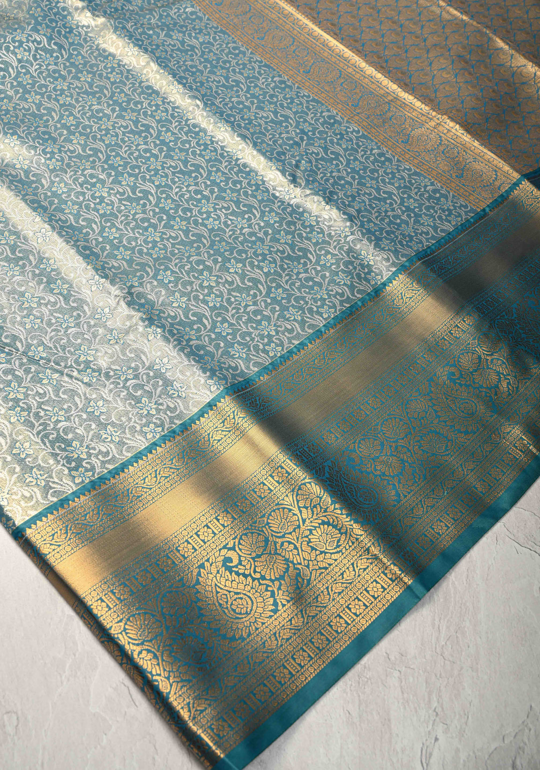 Teal Blue Kanjivaram Tissue Semi Silk Saree with Meenakari Brocade and Contrast Zari Border
