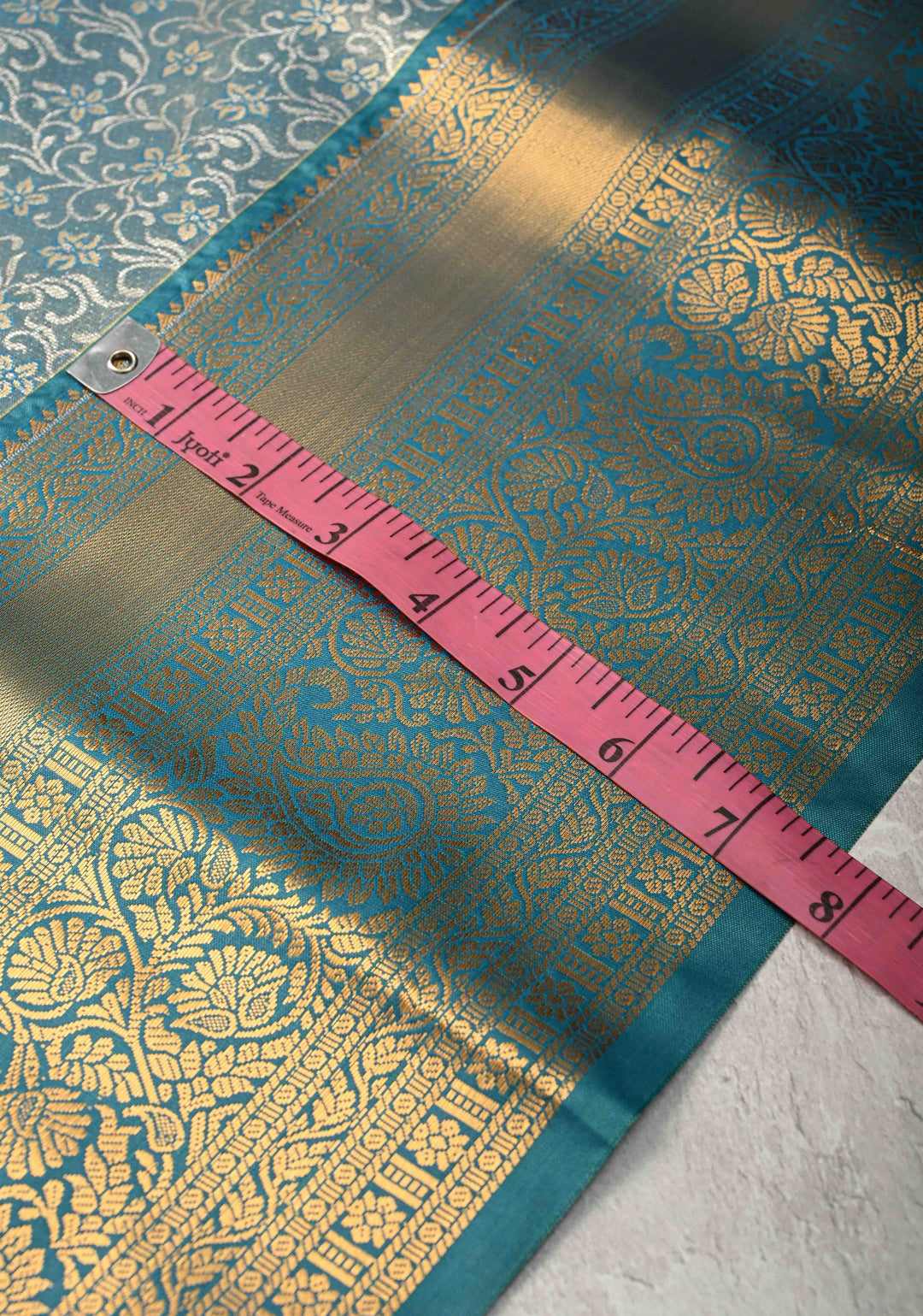 Teal Blue Kanjivaram Tissue Semi Silk Saree with Meenakari Brocade and Contrast Zari Border