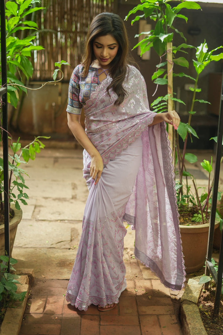 Full Sequins Embellished Georgette Saree in mauve with Scalloped border