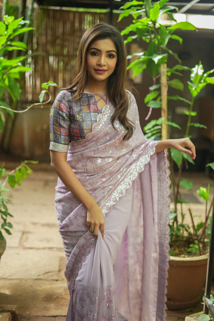 Full Sequins Embellished Georgette Saree in mauve with Scalloped border