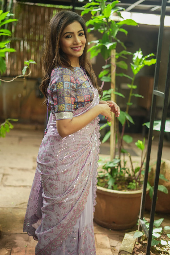 Full Sequins Embellished Georgette Saree in mauve with Scalloped border