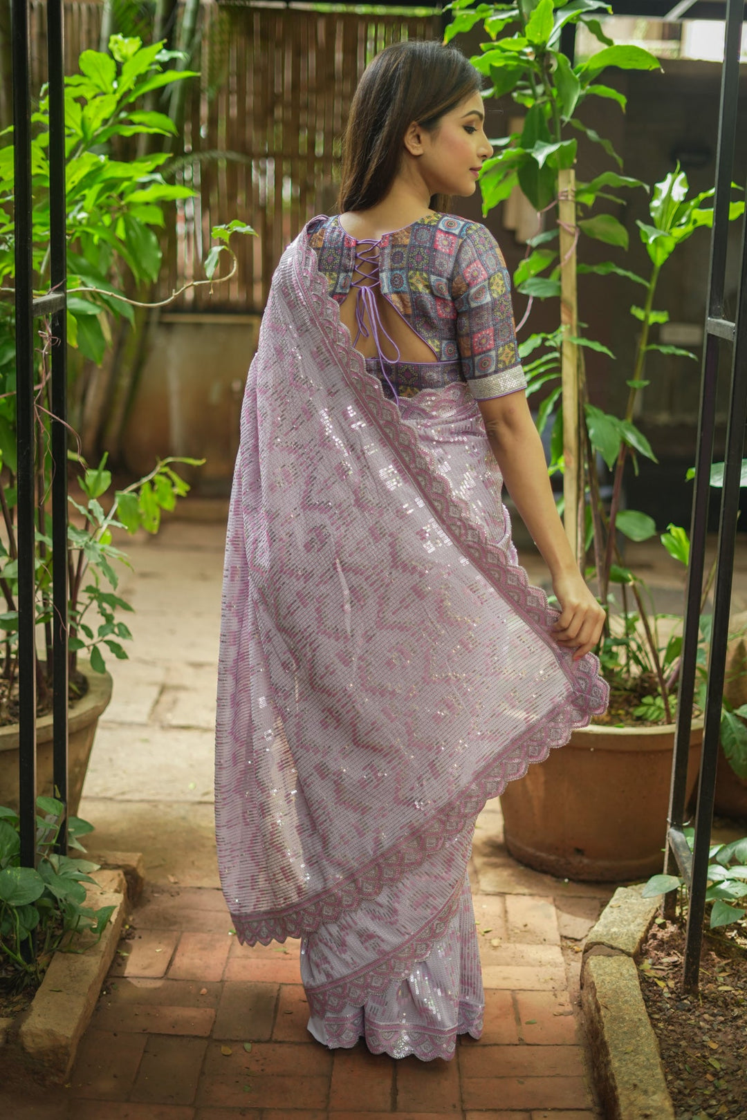 Full Sequins Embellished Georgette Saree in mauve with Scalloped border