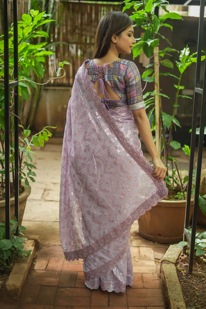 Full Sequins Embellished Georgette Saree in mauve with Scalloped border