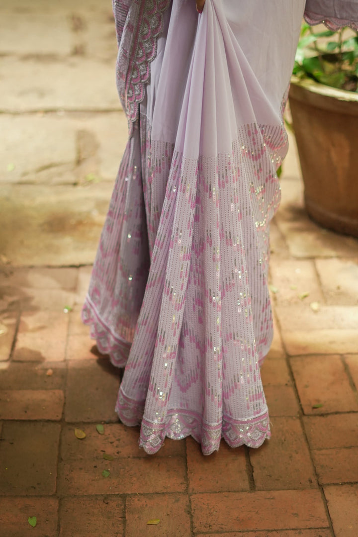 Full Sequins Embellished Georgette Saree in mauve with Scalloped border