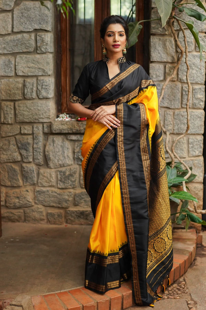 Yellow Exquisite Korvai Gadwal Silk Saree with Black  Borders | SILK MARK CERTIFIED