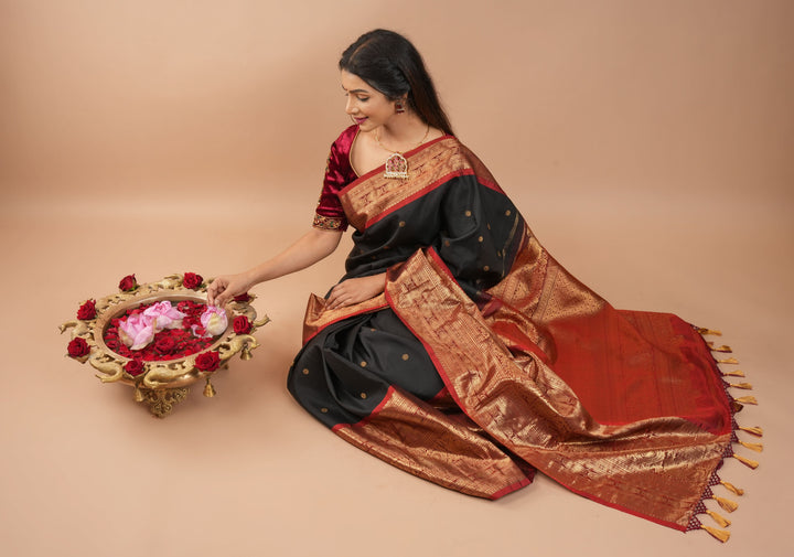 Pure Gadwal Silk Saree in Black color with extravagant 16" wide zari Border | SILK MARK CERTIFIED