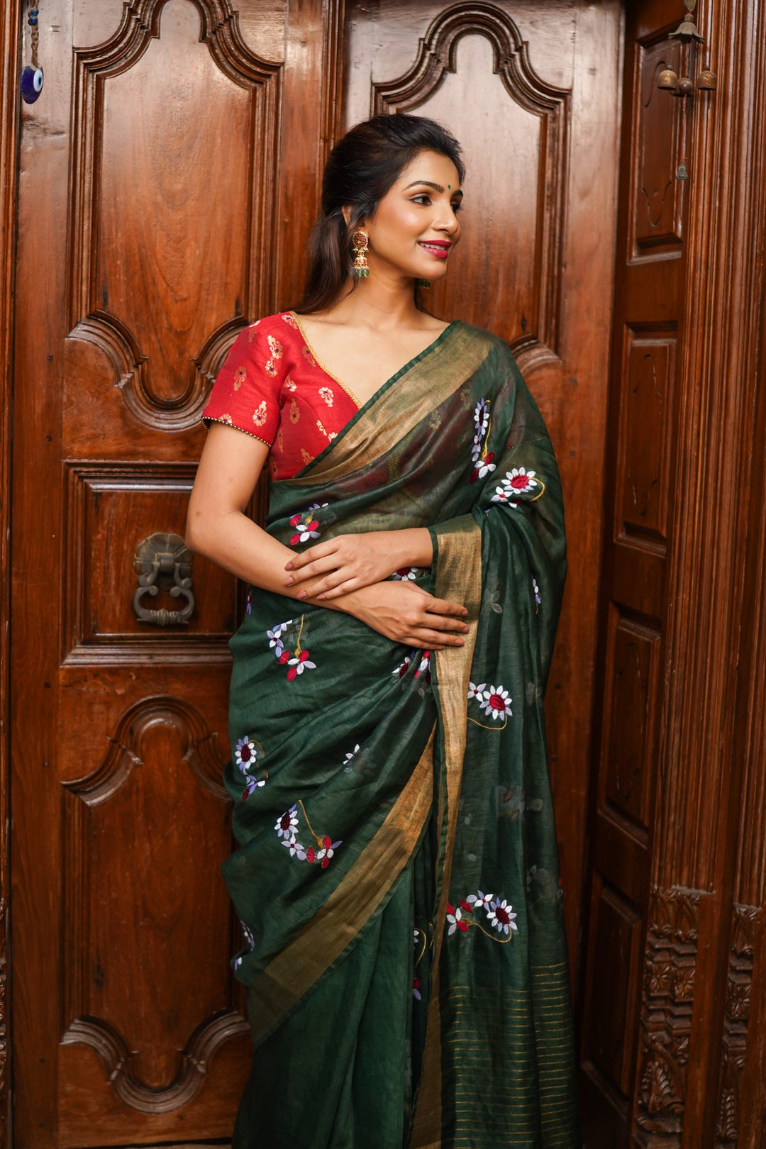 Pre order Hunter Green Silk Linen Saree with Moti Nath Embroidery,Woven zari Borders and Long Tassels