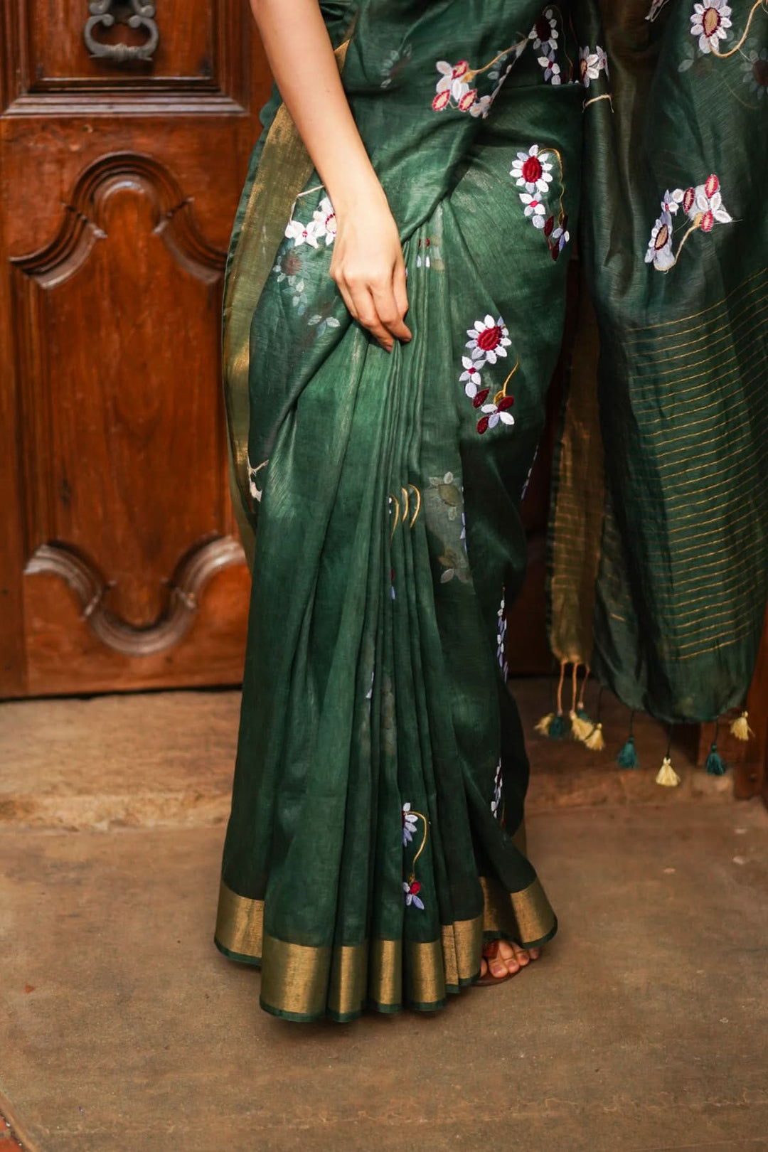 Pre order Hunter Green Silk Linen Saree with Moti Nath Embroidery,Woven zari Borders and Long Tassels