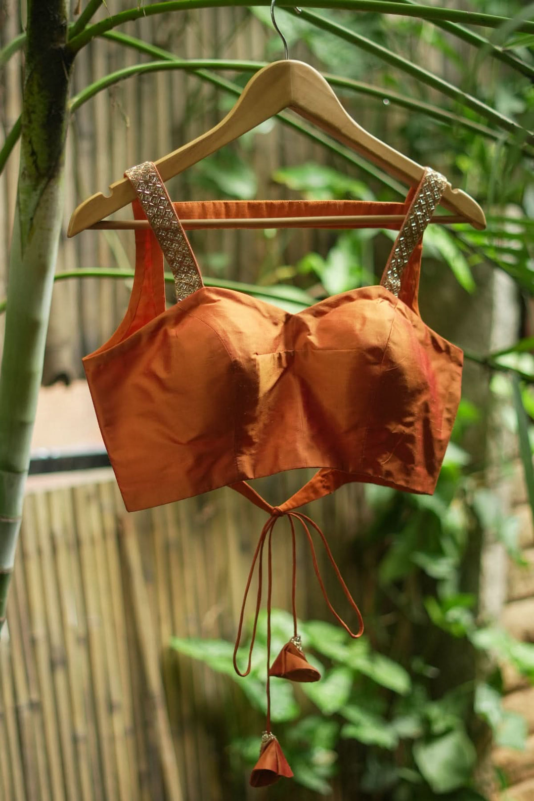 Strappy Blouse in Orange Silk with Sweetheart neckline and cutdana embellishments | SHOBITAM