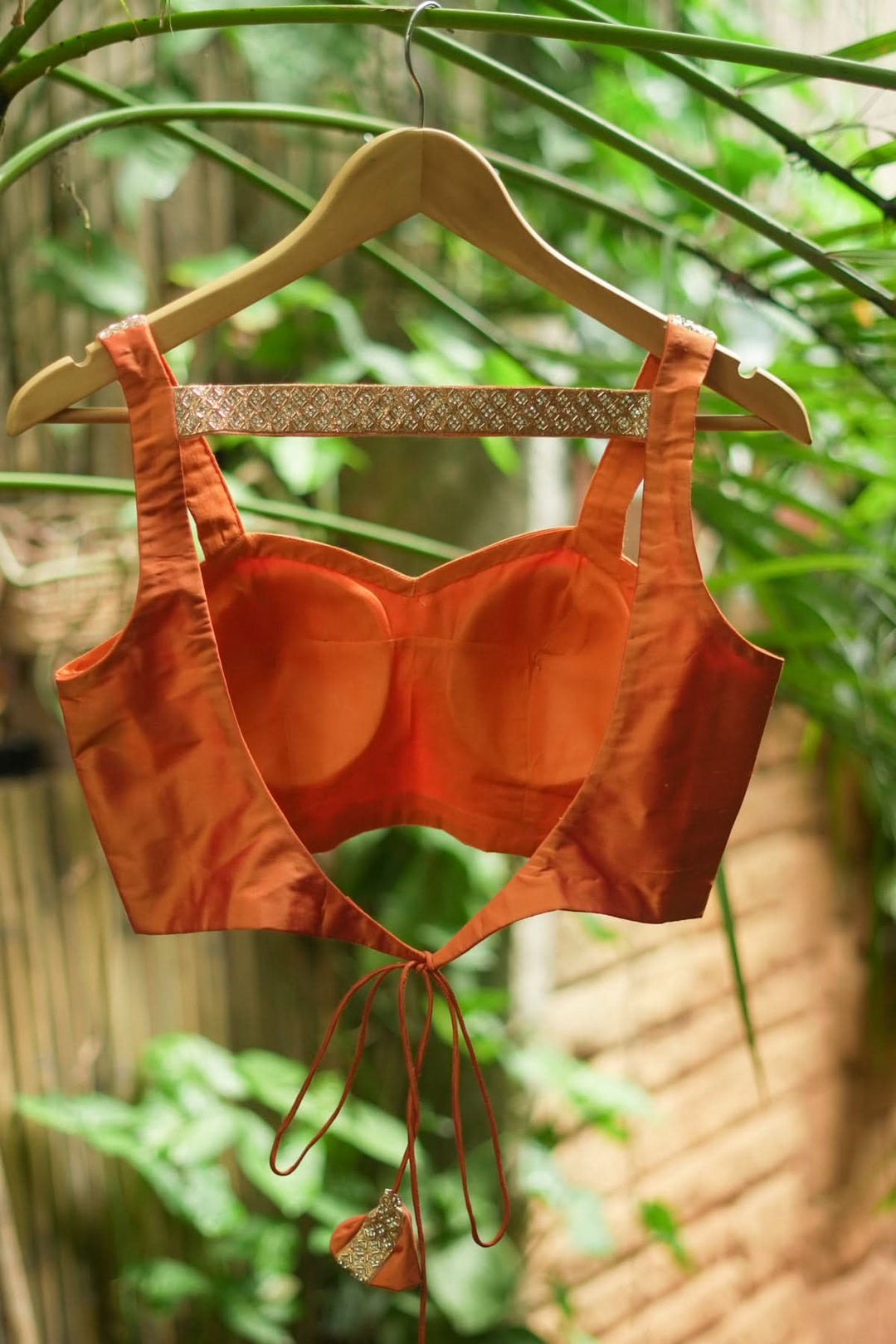 Strappy Blouse in Orange Silk with Sweetheart neckline and cutdana embellishments | SHOBITAM